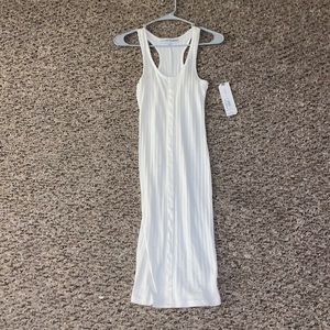 Mid length sleeveless body con white dress